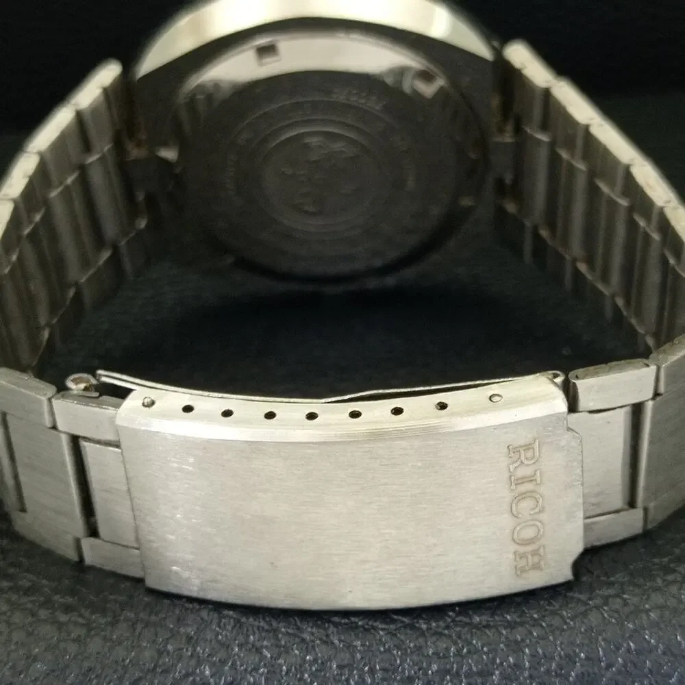Vintage 1980 Ricoh Automatic Mens Silver Watch W/daydate & Red accents